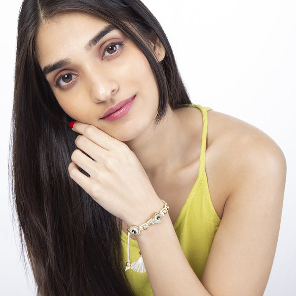 model wearing handmade gold brass sequin bracelet