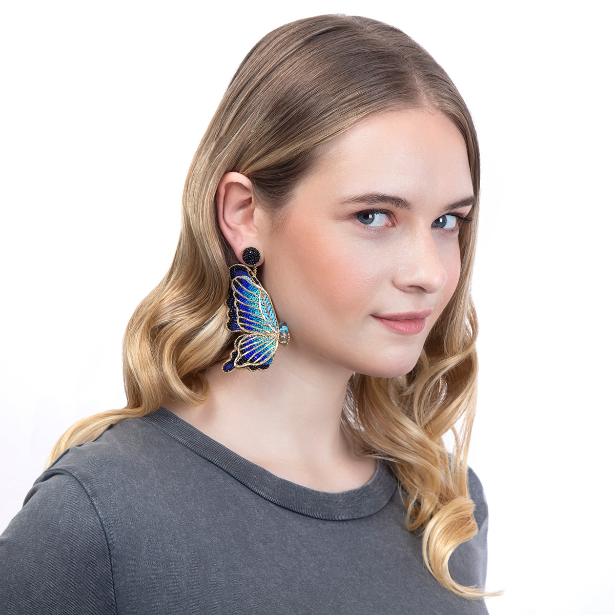 Model wearing our Hand embroidered butterfly earrings